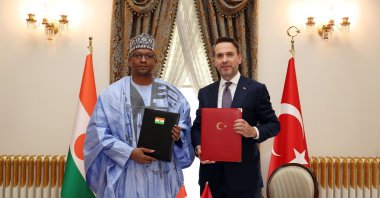 Energy and Natural Resources Minister Alparslan Bayraktar (R) and Niger's Minister of Mines Abarchi Ousmane during a signing ceremony on cooperation in mining, Istanbul, Türkiye, Oct. 22, 2024. (AA Photo)