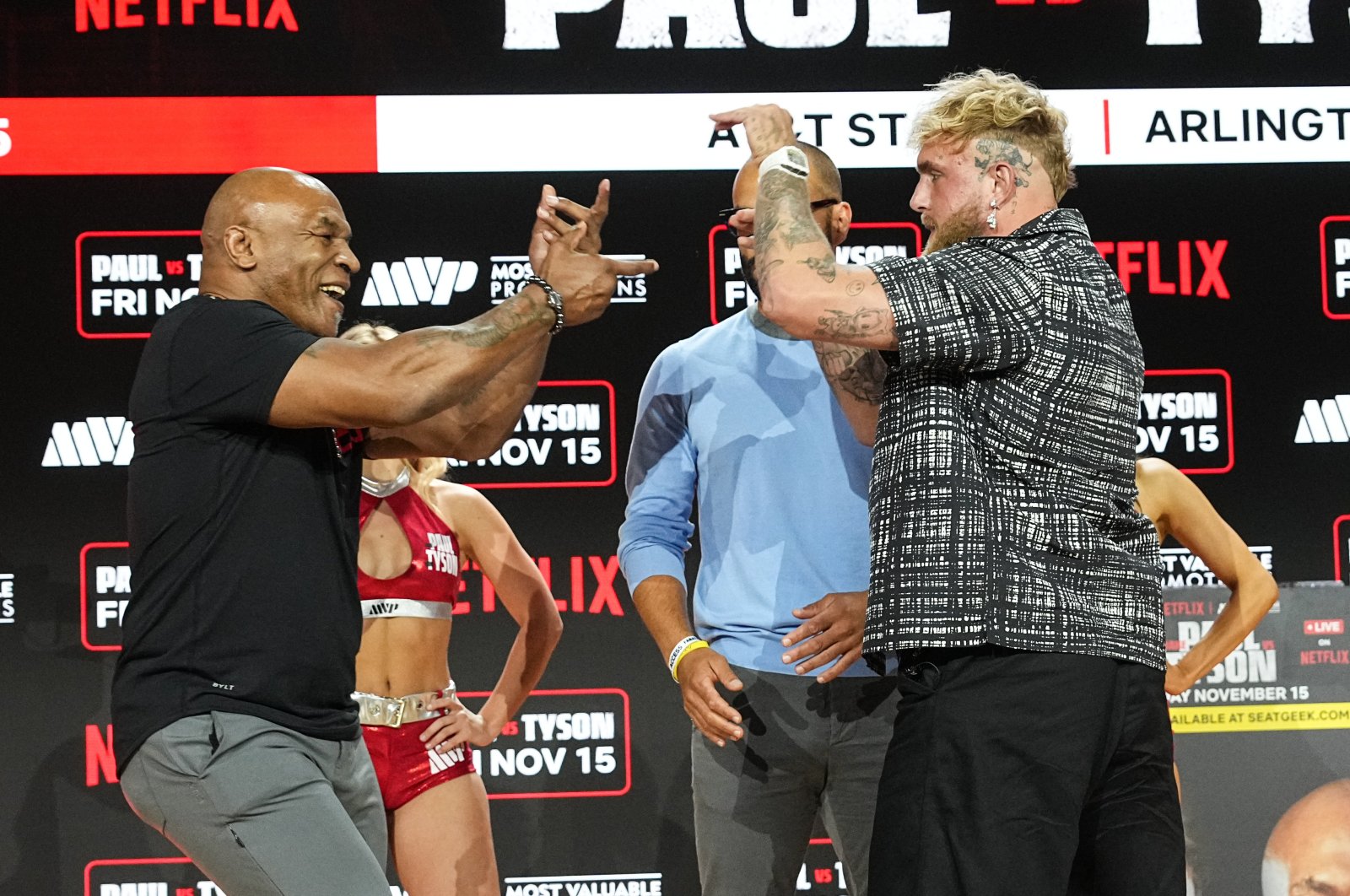 Mike Tyson (L) and Jake Paul hold a news conference during Fanatics Fest NYC at Javits Center, New York City, U.S., Aug. 18, 2024. (Getty Images Photo)