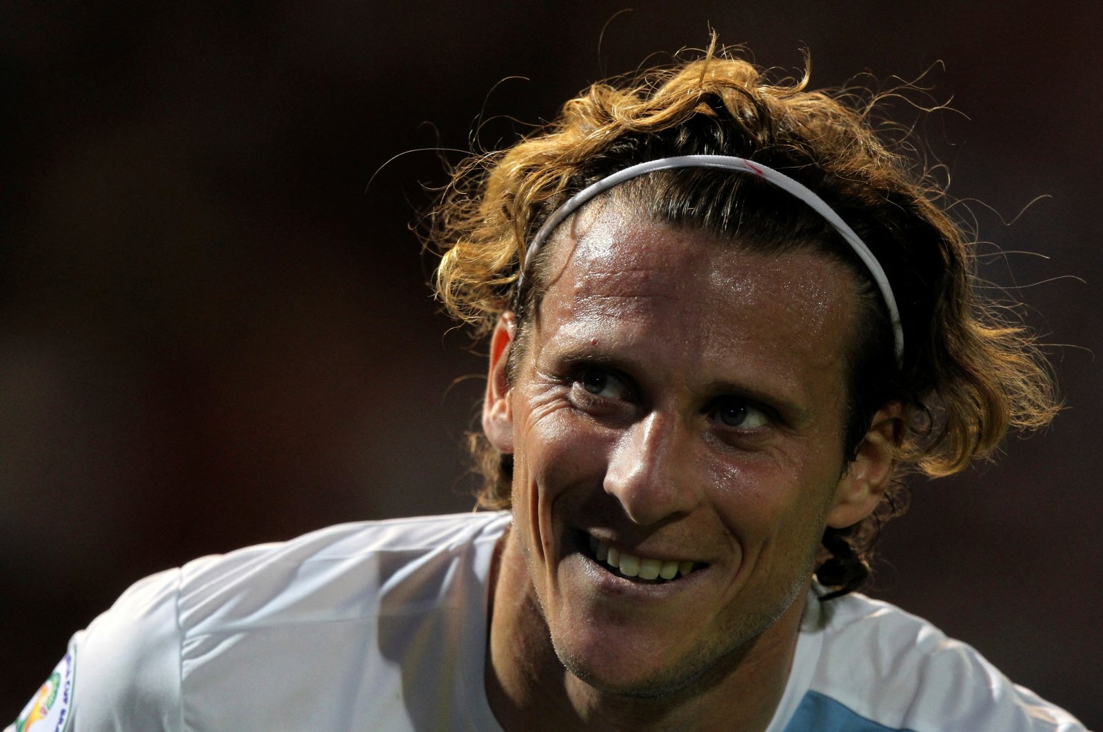 Uruguay&#039;s Diego Forlan smiles during a 2014 World Cup qualifying football match against Argentina, Mendoza, Argentina, Oct. 12, 2012. (Reuters Photo)