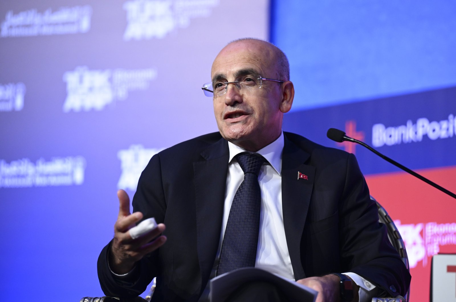 Treasury and Finance Minister Mehmet Şimşek speaks at a panel on the sidelines of the Turkish-Arab Economic Forum, Istanbul, Türkiye, Oct. 17, 2024. (AA Photo)