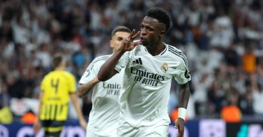 Real Madrid's Vinicius Junior celebrates scoring a hat trick and his team's fifth goal during the UEFA Champions League, league phase Day 3 football match between Real Madrid and Borussia Dortmund at the Santiago Bernabeu stadium, Madrid, Spain, Oct. 22, 2024. (AFP Photo)