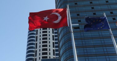 Turkish and European Union fly at the business and financial district of Levent in Istanbul, Türkiye, Sept. 4, 2017. (Reuters Photo)