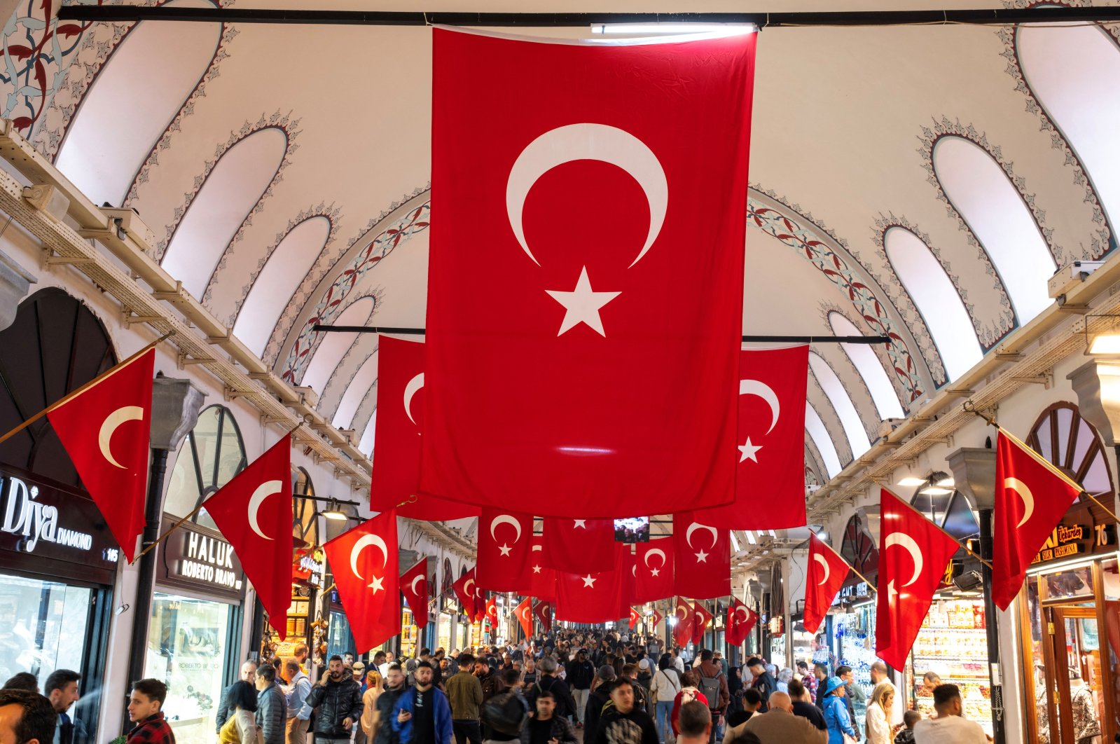 People stroll through the historic Grand Bazaar, a popular tourist attraction and one of the country&#039;s most important economic venues, Istanbul, Türkiye, Oct. 22, 2024. (Reuters Photo)