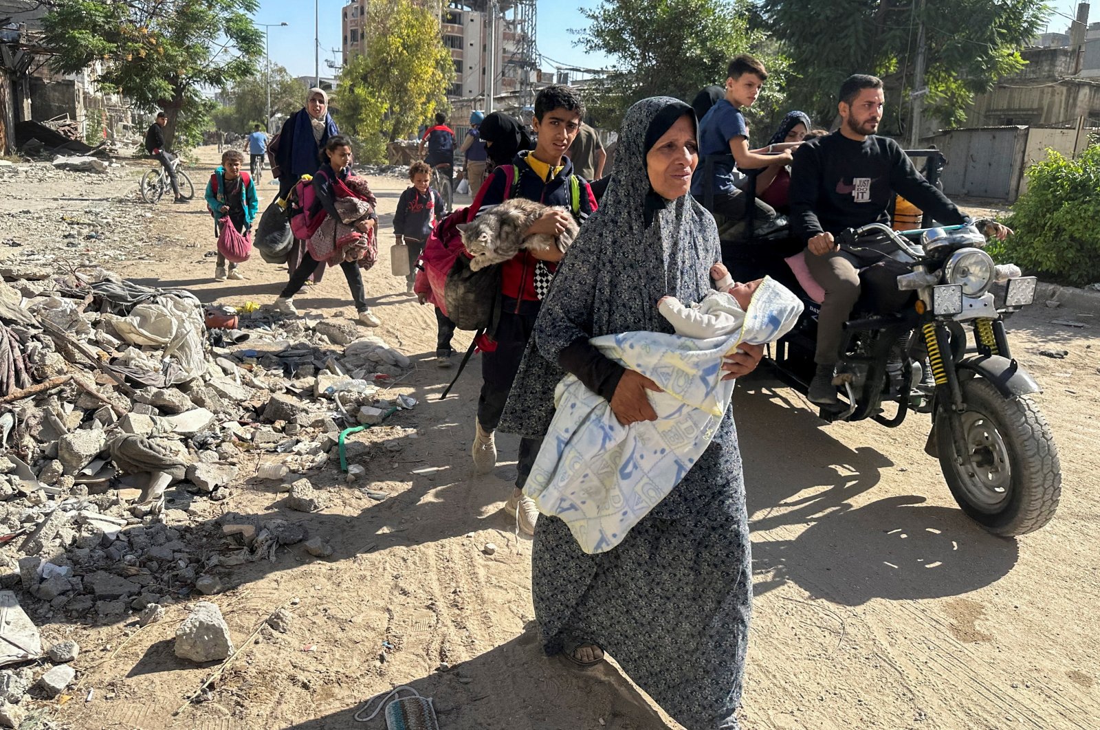 Displaced Palestinians flee amid an Israeli military operation in Jabalia, northern Gaza Strip, Palestine, Oct. 23, 2024. (Reuters Photo)