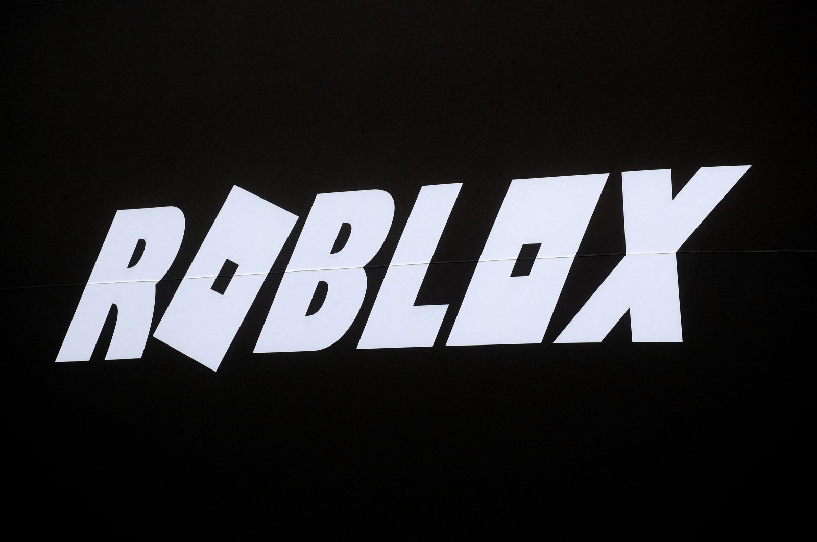 The Roblox logo is displayed on a banner, New York, U.S., March 10, 2021. (Reuters Photo)