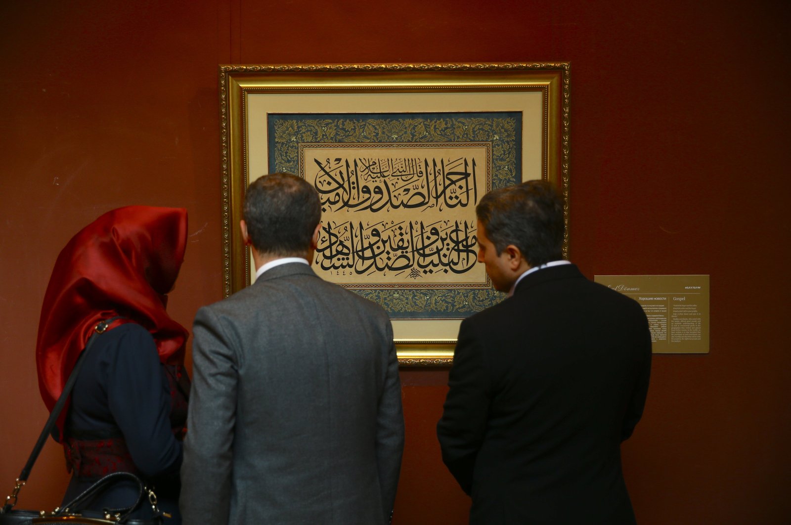 Visitors examine the artworks at the &quot;Heritage Beyond Time: The Silk Road&quot; exhibition in Baku, Azerbaijan, Oct. 22, 2024. (AA Photo)