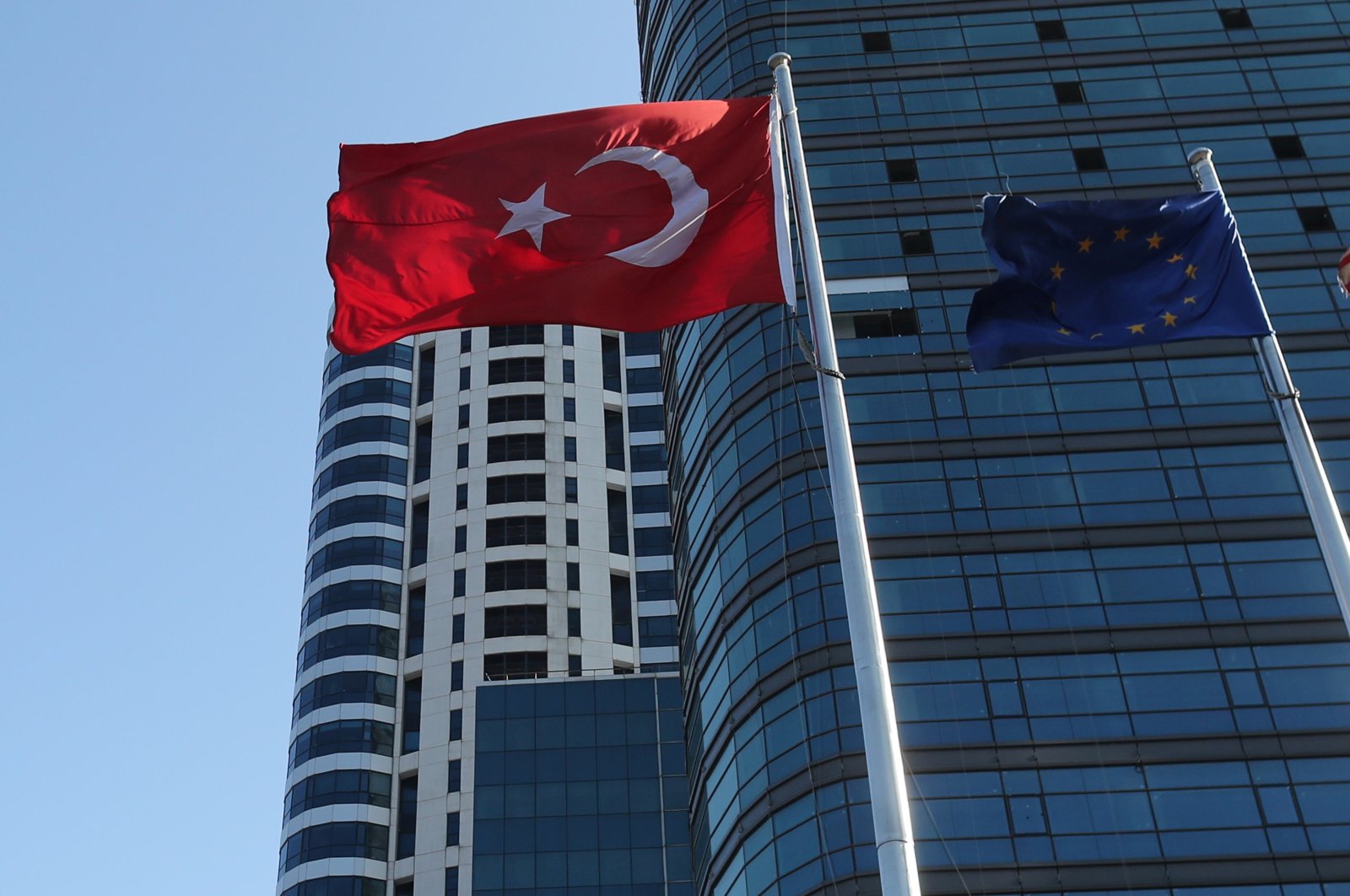 Turkish and European Union fly at the business and financial district of Levent in Istanbul, Türkiye, Sept. 4, 2017. (Reuters Photo)