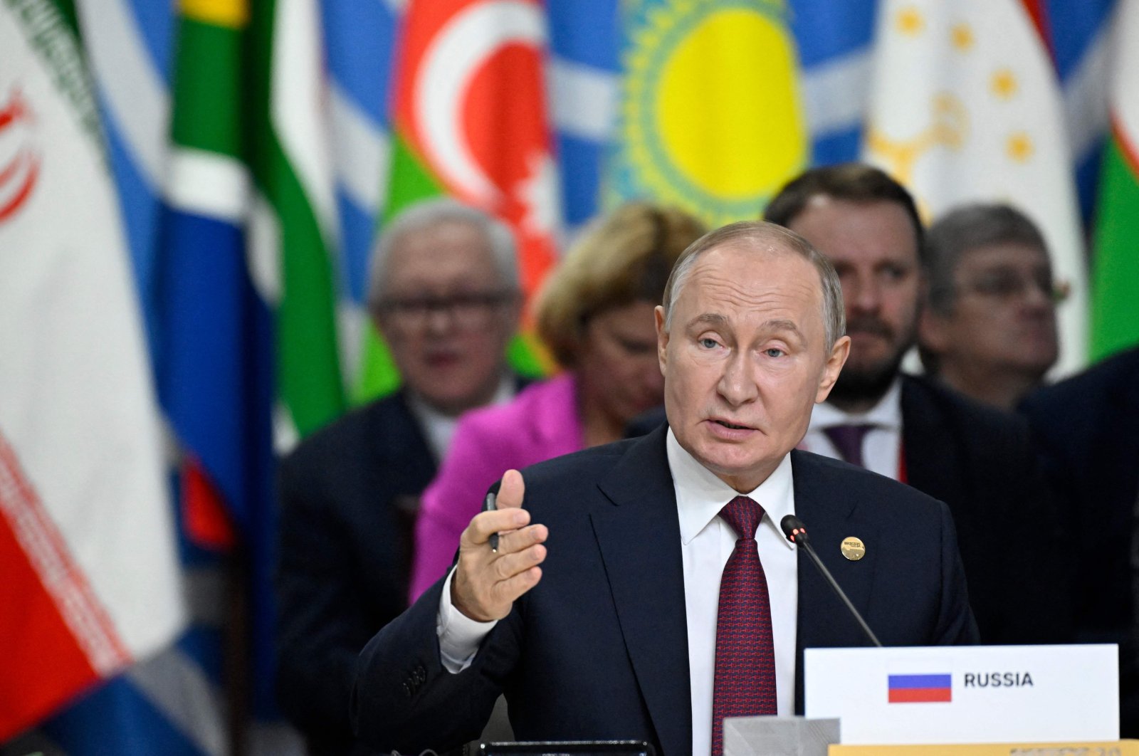 Russia&#039;s President Vladimir Putin gestures as he speaks during the extended format meeting of the BRICS summit in Kazan on Oct. 23, 2024. (AFP Photo)