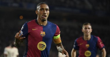 Barcelona&#039;s Raphinha celebrates scoring a hat trick during the UEFA Champions League, league phase day 3 football match against Bayern Munich at the Estadi Olimpic Lluis Companys, Barcelona, Spain, Oct. 23, 2024. (AA Photo)