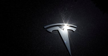 The Tesla logo is seen on a car in Los Angeles, California, U.S., July 9, 2020. (Reuters Photo)