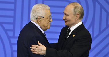  Russian President Vladimir Putin (R) greets Palestinian President Mahmoud Abbas at the BRICS summit in Kazan, Russia, Oct. 23, 2024. (AA Photo)