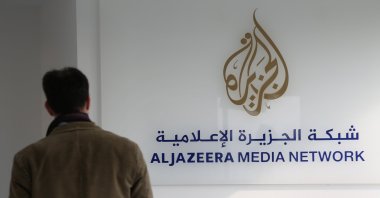A journalist enters the Al Jazeera bureau in Berlin, Germany, Feb. 27, 2014. (Getty Images)