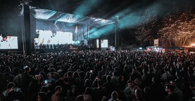 Black Coffee performs on stage with a crowd in attendance at the Maximum Uniq concert, Istanbul, Türkiye, Oct. 12, 2024. (AA Photo)