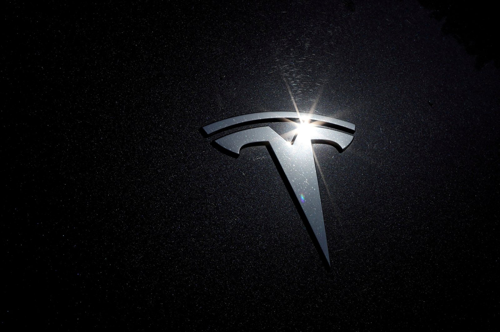 The Tesla logo is seen on a car in Los Angeles, California, U.S., July 9, 2020. (Reuters Photo)