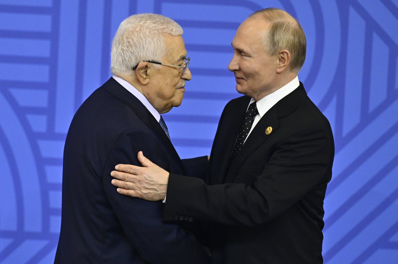  Russian President Vladimir Putin (R) greets Palestinian President Mahmoud Abbas at the BRICS summit in Kazan, Russia, Oct. 23, 2024. (AA Photo)