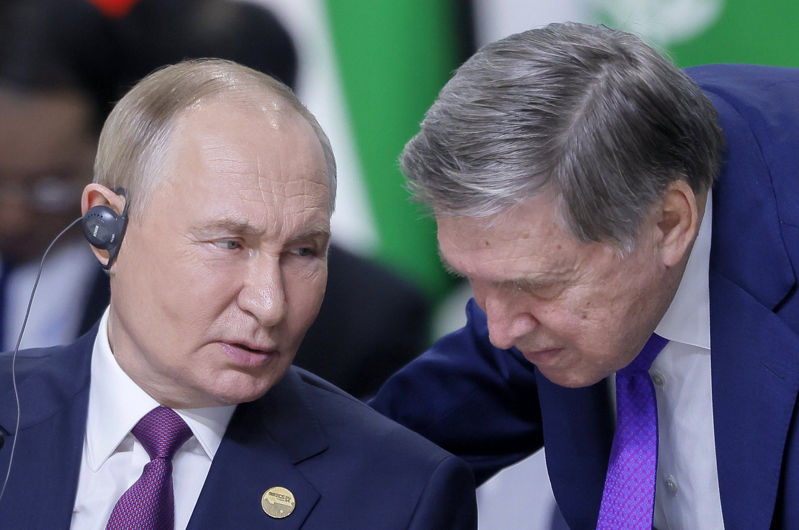 Russian President Vladimir Putin speaks with his aide Yuri Ushakov at the BRICS summit in Kazan, Russia, Oct. 24, 2024. (EPA Photo)