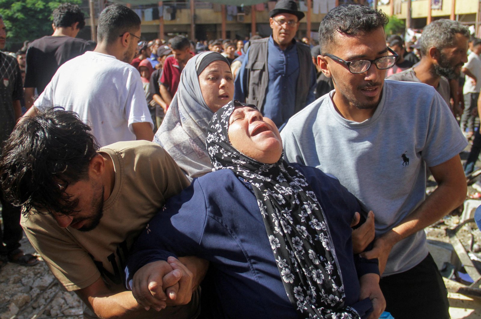 A Palestinian woman reacts at the site of an Israeli strike on a school sheltering displaced people in Jabalia in the northern Gaza Strip, Sept. 26, 2024. (Reuters Photo)