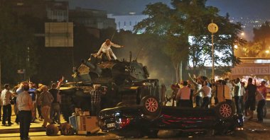 People move to stop tanks controlled by putschists, Ankara, Türkiye, July 16, 2016. (AP Photo)