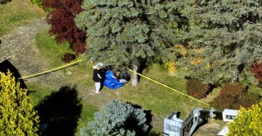 Gülenist Terror Group (FETÖ) members dig a hole to bury ringleader Fetullah Gülen on the grounds of his residence in Saylorsburg, Pennsylvania, U.S., Oct. 24, 2024. (AA Photo)
