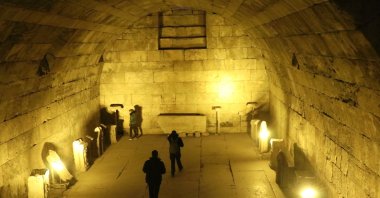 Visitors explore the ancient city of Aizanoi at night, illuminated by new lights, Kütahya, Türkiye, Oct. 23, 2024. (AA Photo)