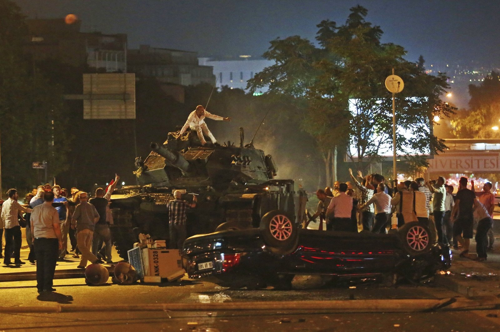 People move to stop tanks controlled by putschists, Ankara, Türkiye, July 16, 2016. (AP Photo)