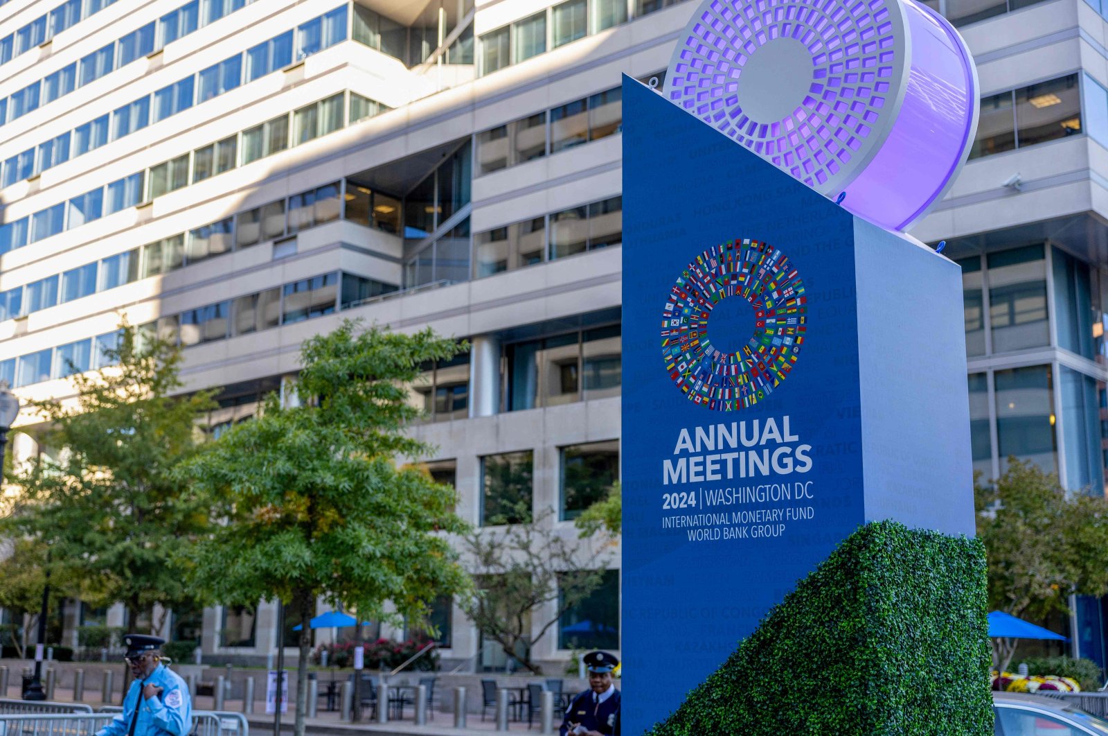 Signage is displayed outside World Bank headquarters during the first day of meetings of the IMF/World Bank, Washington, D.C., U.S., Oct. 21, 2024. (AFP Photo)