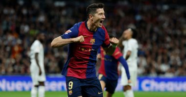 Barcelona's Robert Lewandowski celebrates scoring the opening goal during the match against Real Madrid at the Santiago Bernabeu stadium, Madrid, Spain, Oct. 26, 2024. (AFP Photo)