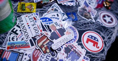 Pro-Trump stickers are placed on a table during the New York Young Republican Club&#039;s 6th annual rooftop MAGAWEEN party in New York, U.S., Oct. 26, 2024. (AFP Photo)