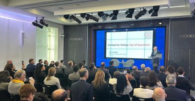 Treasury and Finance Minister Mehmet Şimşek delivers a speech at the Brookings Institution, Washington D.C., U.S., Oct. 25, 2024. (DHA Photo)