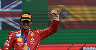 Ferrari&#039;s Spanish driver Carlos Sainz celebrates on the podium after winning the Mexico City Formula One Grand Prix at the Hermanos Rodriguez racetrack, Mexico City, Mexico, Oct. 27, 2024. (AFP Photo)