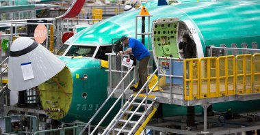 Employees work on Boeing 737 Max airplanes at the Boeing Renton Factory, Renton, Washington, U.S., March 27, 2019. (AFP Photo)