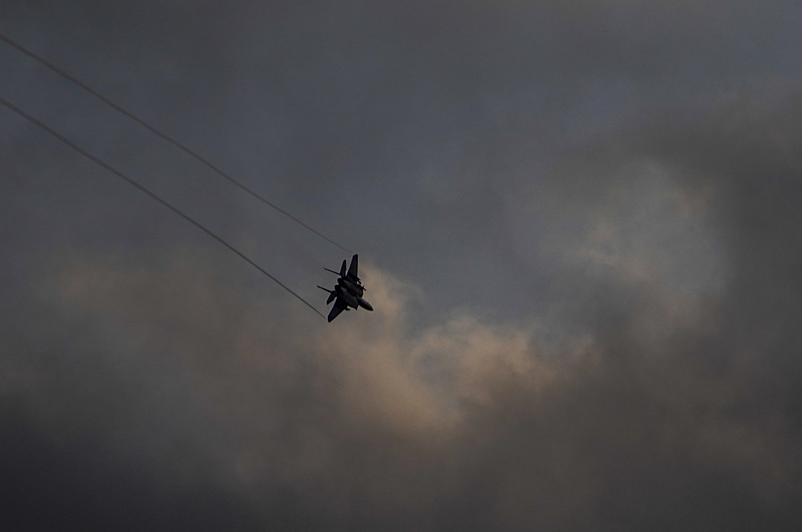 An Israeli Air Force F-15 jet fighter maneuvers over northern Israel, Feb. 27, 2024. (AP Photo)