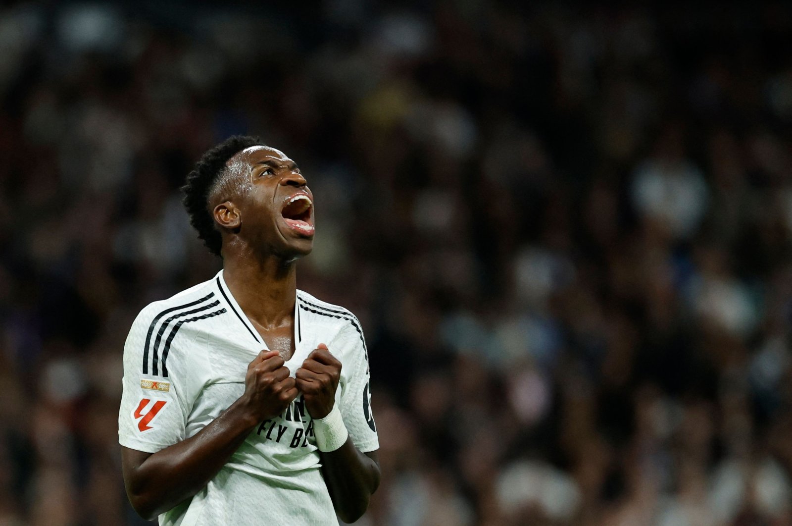 Real Madrid&#039;s Vinicius Junior reacts during the La Liga match against Barcelona at the Santiago Bernabeu stadium, Madrid, Spain, Oct. 26, 2024. (AFP Photo)