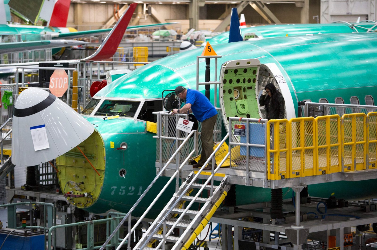 Employees work on Boeing 737 Max airplanes at the Boeing Renton Factory, Renton, Washington, U.S., March 27, 2019. (AFP Photo)