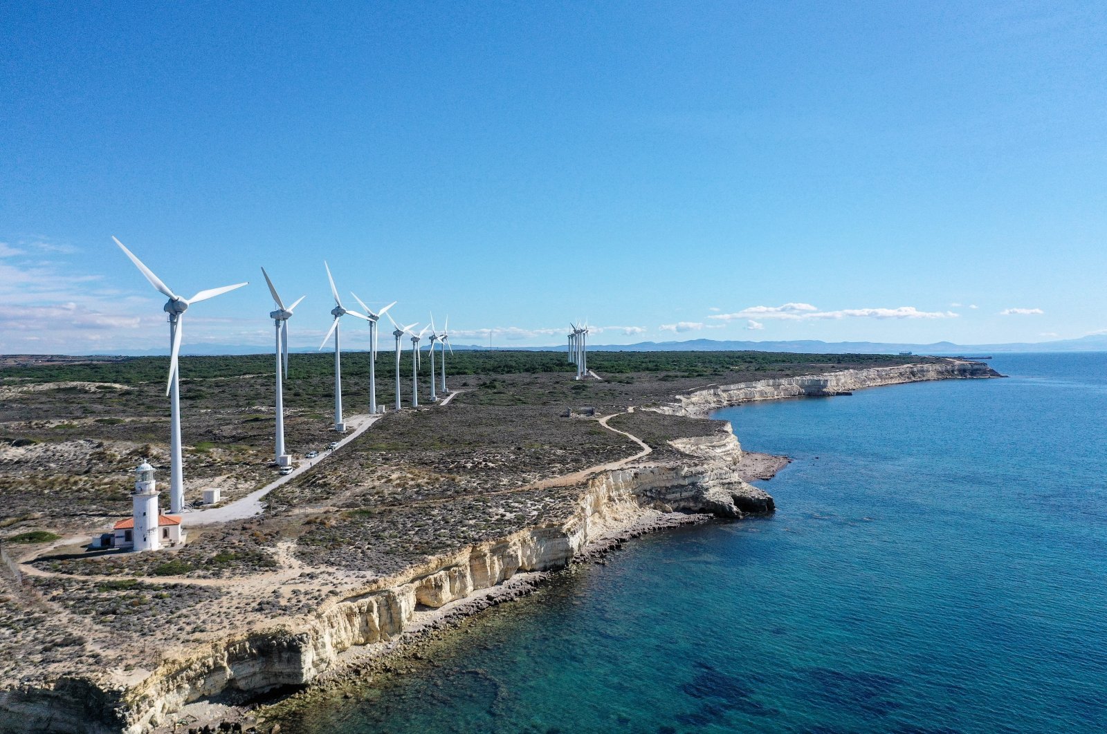 Wind turbines are seen in Bozcaada district of Çanakkale province, northwestern Türkiye, Oct. 20, 2024. (AA Photo)