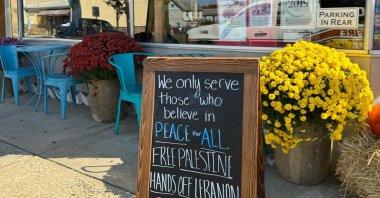 The poster says, &quot;We only serve those who believe in peace for all. Free Palestine, hands off Lebanon,&quot; in front of the restaurant in New Jersey, U.S., Oct. 29, 2024. (AA Photo)