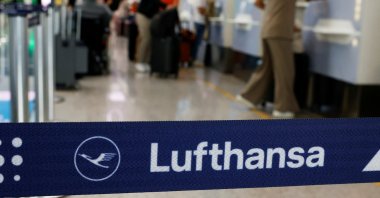 People wait at a Lufthansa check-in at Leonardo da Vinci International Airport, Fiumicino, near Rome, Italy, Sept. 23, 2024. (Reuters Photo)