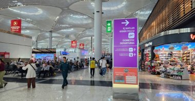 A sign directs passengers to domestic departure flights in Istanbul Airport, Istanbul, Türkiye, June 27, 2023. (Shutterstock Photo)