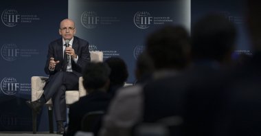 Treasury and Finance Minister Mehmet Şimşek speaks during an Institute of International Finance event in Washington, U.S., Oct. 24, 2024. (AA Photo)