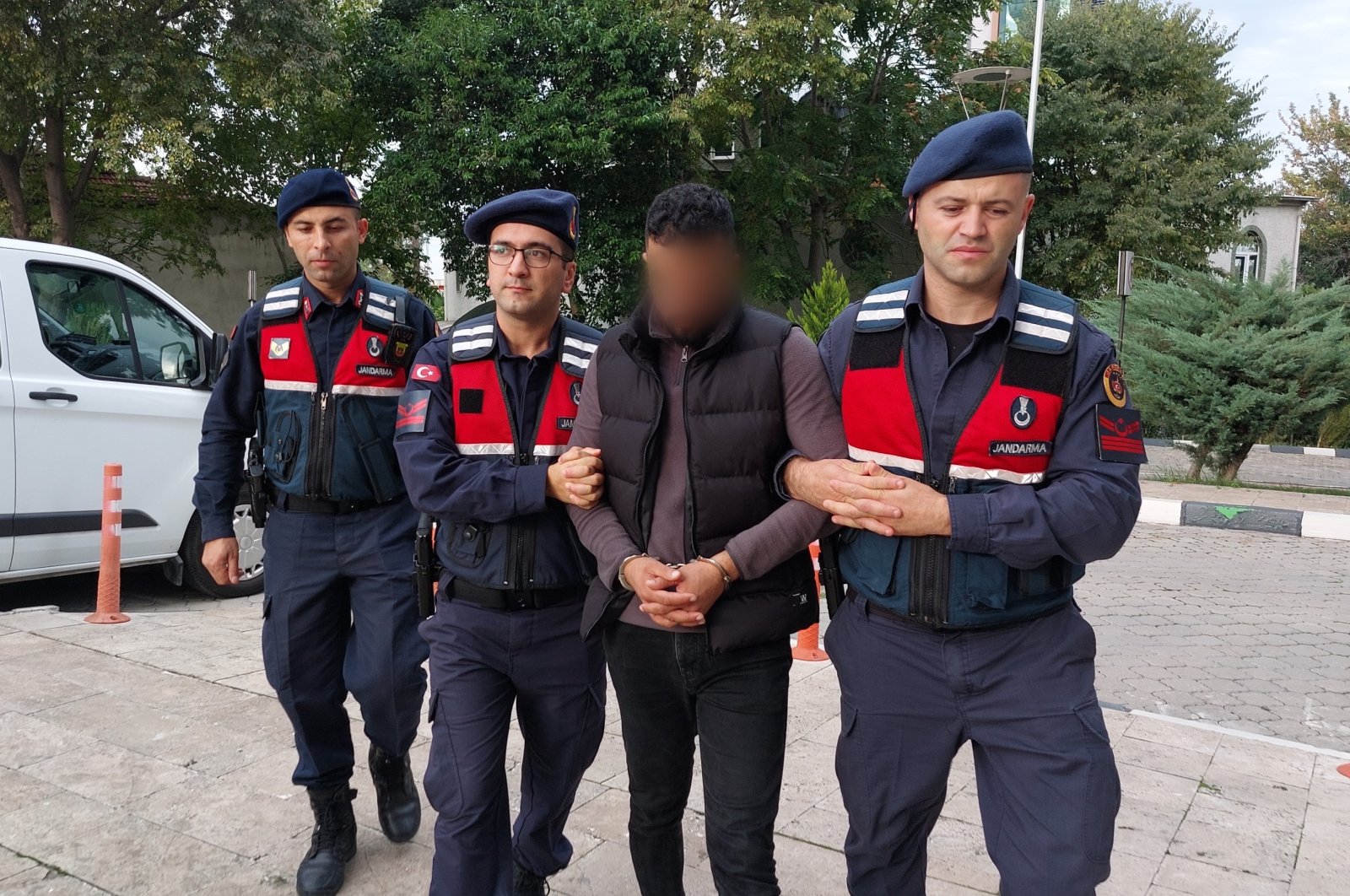 Gendarmerie forces detain a foreign national who provided health care to Daesh terrorists in Syria, in northern Samsun province, Türkiye, Oct. 16, 2024. (IHA Photo)