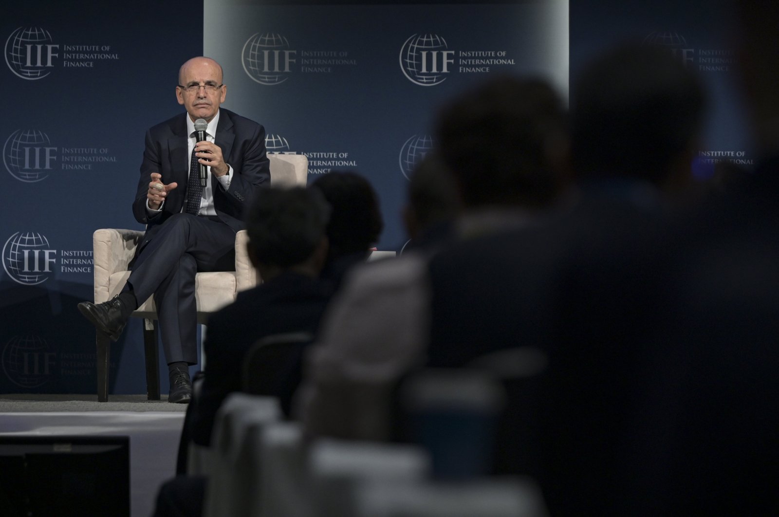 Treasury and Finance Minister Mehmet Şimşek speaks during an Institute of International Finance event in Washington, U.S., Oct. 24, 2024. (AA Photo)