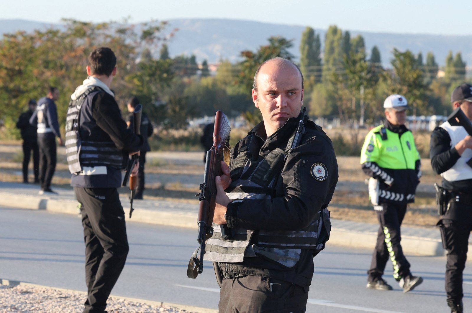 Police and private security guards secure the entrance of the headquarters of Türkiye&#039;s aerospace company TAI, after the terrorist attack, near Kahramankazan, Ankara, Türkiye, Oct. 23, 2024. (Reuters Photo)