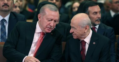 President Recep Tayyip Erdoğan and MHP leader Devlet Bahçeli converse during the Republic Day special program held at the exhibition hall in the Presidential Complex, Ankara, Türkiye, Oct. 29, 2024. (AA Photo)