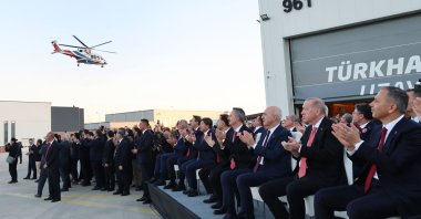 President Recep Tayyip Erdoğan watches as the multirole utility helicopter T625 Gökbey flies over the headquarters of the Turkish Aerospace Industries (TAI), Ankara, Türkiye, Oct. 29, 2024. (AA Photo)