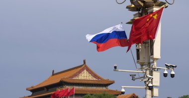 A Russian and Chinese national flag flutter near Tiananmen Gate, in Beijing, China, May 16, 2024. (AP Photo)
