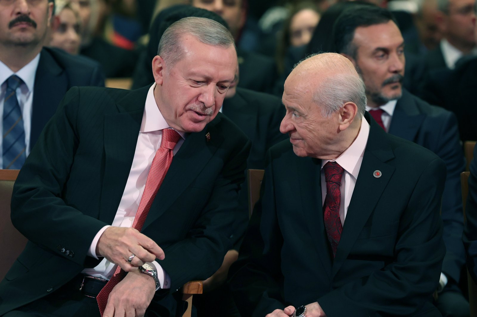 President Recep Tayyip Erdoğan and MHP leader Devlet Bahçeli converse during the Republic Day special program held at the exhibition hall in the Presidential Complex, Ankara, Türkiye, Oct. 29, 2024. (AA Photo)