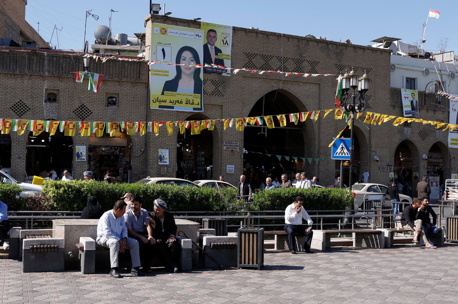 People sit on the benches, one day after Iraq&#039;s Kurdistan region parliamentary election, Irbil, Iraq, Oct. 21, 2024. (Reuters Photo)