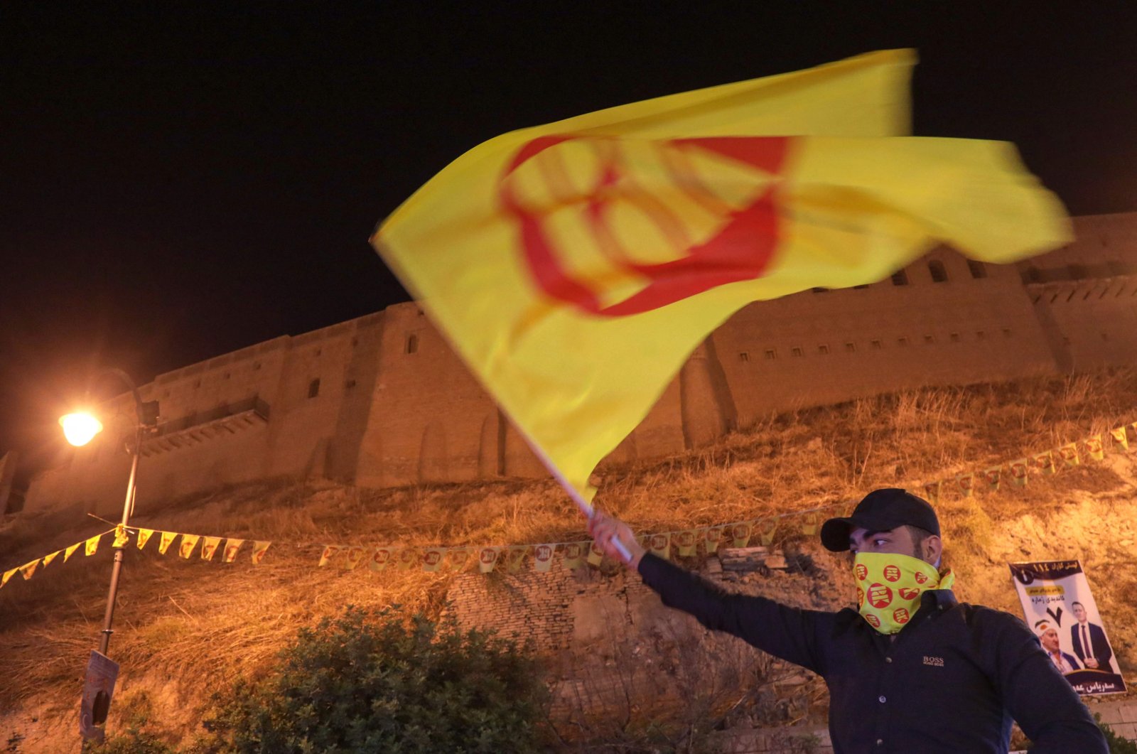 A supporter of the Kurdistan Democratic Party (KDP) celebrates their party&#039;s victory in the parliamentary election, Irbil, northern Iraq, Oct. 21, 2024. (AFP Photo)