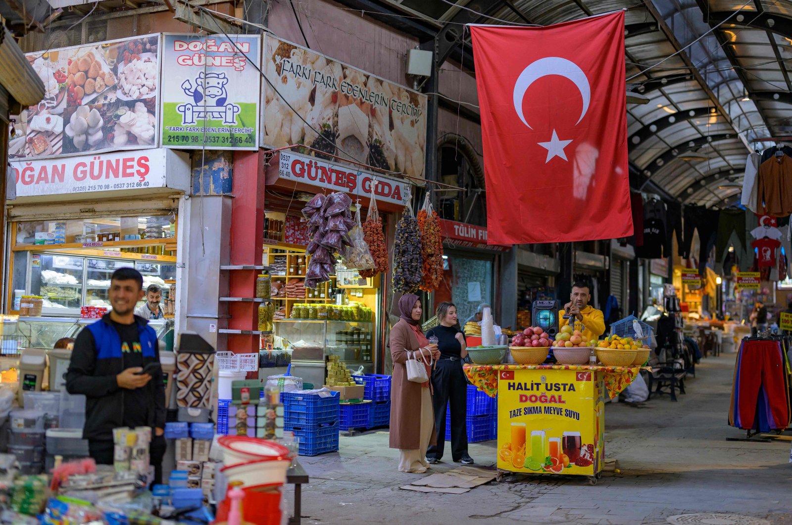 Shopkeepers wait for costumers at a bazaar in the old town of Antakya in Hatay province, southern Türkiye, Oct. 24, 2024. (AFP photo)