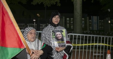 A person holds an image of Turkish-American human rights activist Ayşenur Ezgi Eygi during a pro-Palestinian rally in front of the Israeli Embassy in Washington D.C., U.S., Sept. 14, 2024. (Reuters Photo)